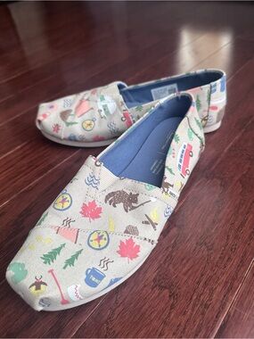 NWOT- TOMS Canvas Slip-On Shoes in Beige Adventure Print